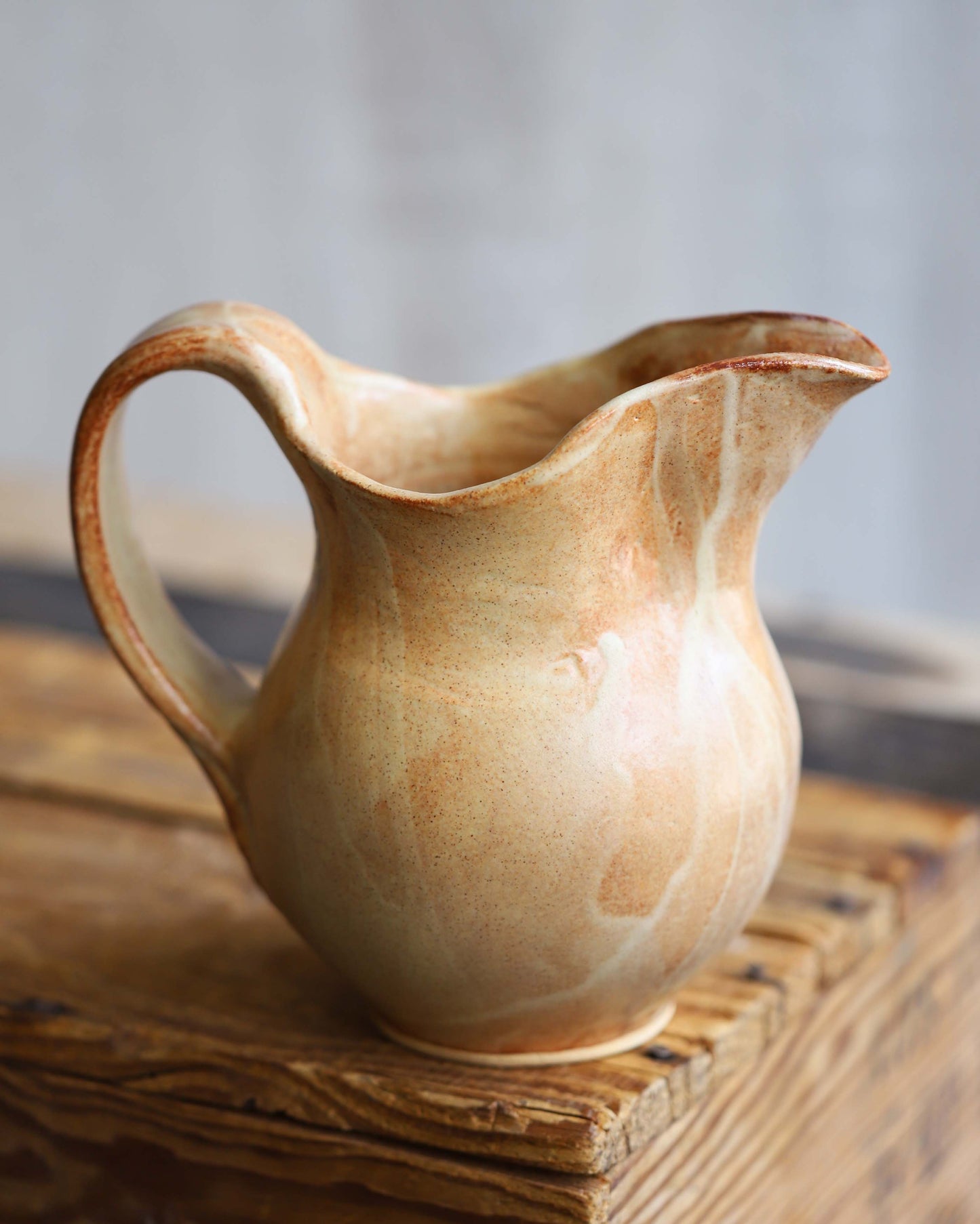 Tan Pitcher